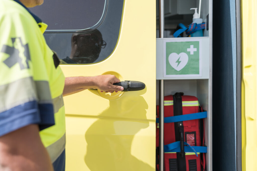 emergency medical responder opening ambulance door 2026 03 25 22 41 49 utc